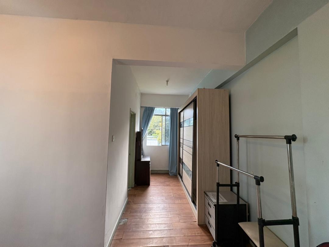 Hallway and storage inside Colonnades Condominium