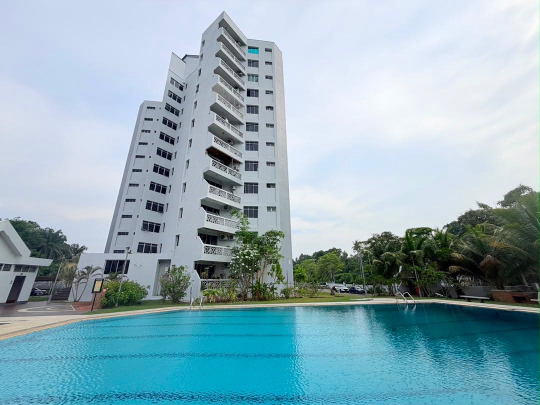Colonnades Condominium building and swimming pool